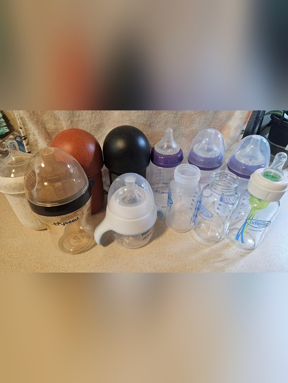 11 Assorted Baby Bottles